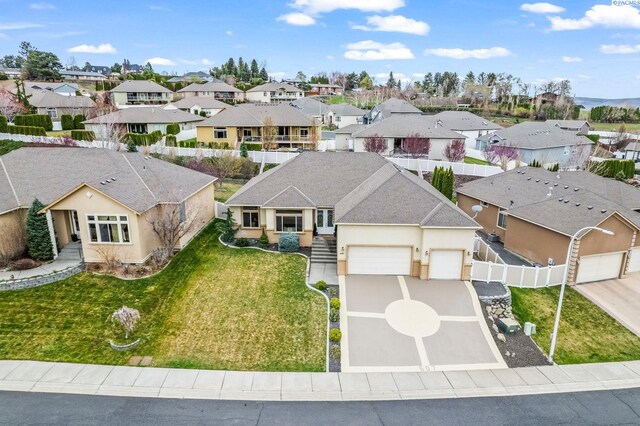 drone / aerial view with a residential view