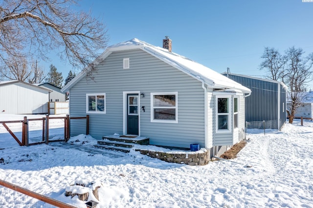 view of snow covered property