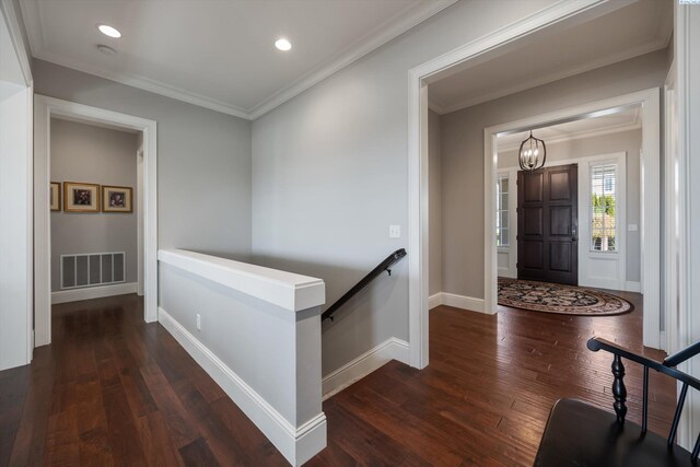 1016 SE Crestlane Dr, College Place, WA 99324 - entryway with dark wood-style flooring, baseboards, ornamental molding, a chandelier, and visible vents