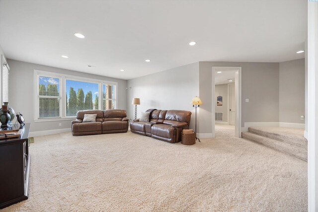 1016 SE Crestlane Dr, College Place, WA 99324 - living area with light colored carpet, baseboards, visible vents, and recessed lighting