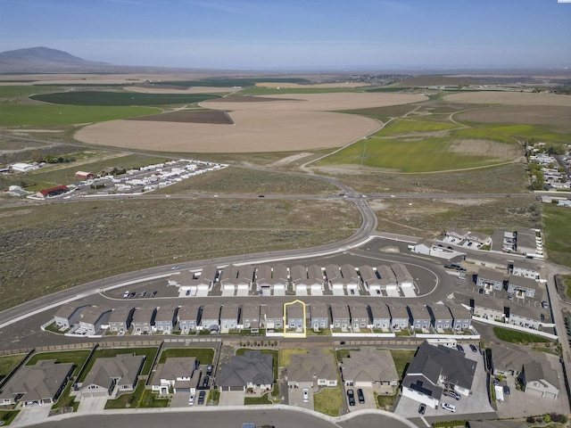 birds eye view of property with a residential view