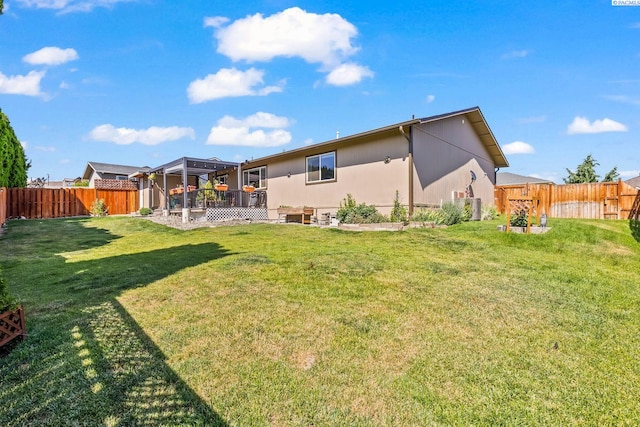 602 N 57th St, Yakima, WA 98901 - rear view of house with a fenced backyard