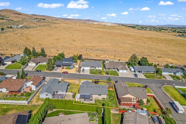 602 N 57th St, Yakima, WA 98901 - aerial perspective of suburban area featuring property parcel outlined and mountains