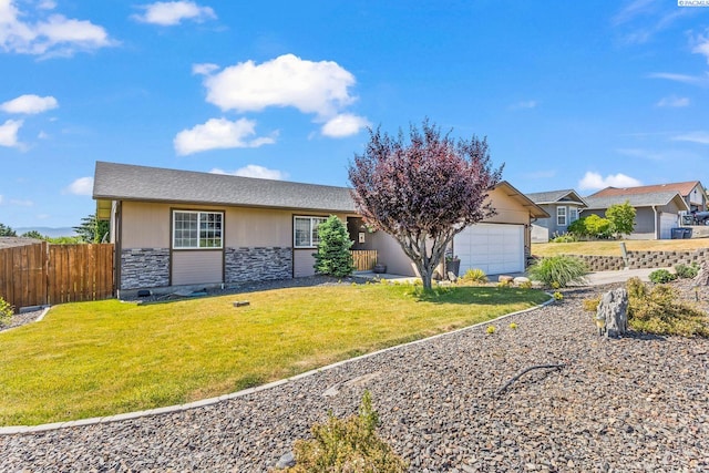 602 N 57th St, Yakima, WA 98901 - single story home with stone siding and an attached garage