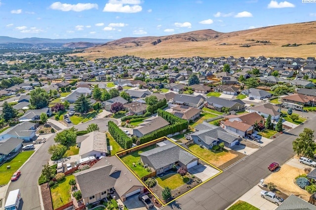 602 N 57th St, Yakima, WA 98901 - aerial view of residential area with a mountainous background and property parcel outlined