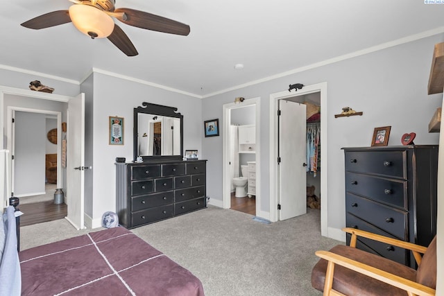 602 N 57th St, Yakima, WA 98901 - carpeted bedroom with crown molding, a walk in closet, ensuite bath, a ceiling fan, and a closet