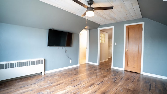 201 W Cooper St, Colfax, WA 99111 - bonus room with radiator heating unit, lofted ceiling, a ceiling fan, wood finished floors, and baseboards