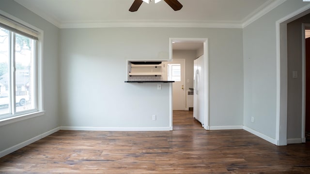 201 W Cooper St, Colfax, WA 99111 - spare room featuring ceiling fan, ornamental molding, baseboards, and wood finished floors