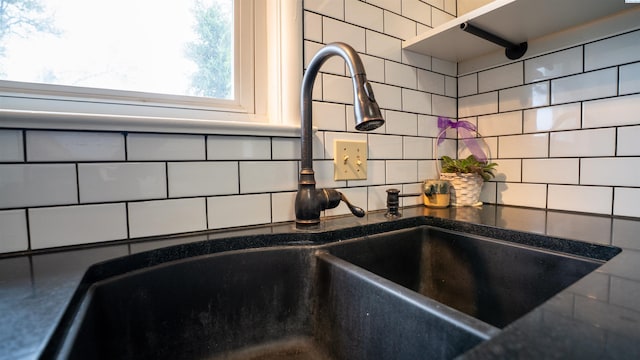201 W Cooper St, Colfax, WA 99111 - kitchen view of a sink, backsplash, and dark countertops