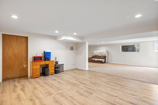 basement with light wood-type flooring