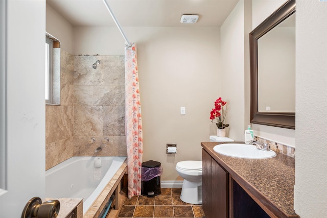 full bathroom featuring vanity, shower / tub combo, and toilet