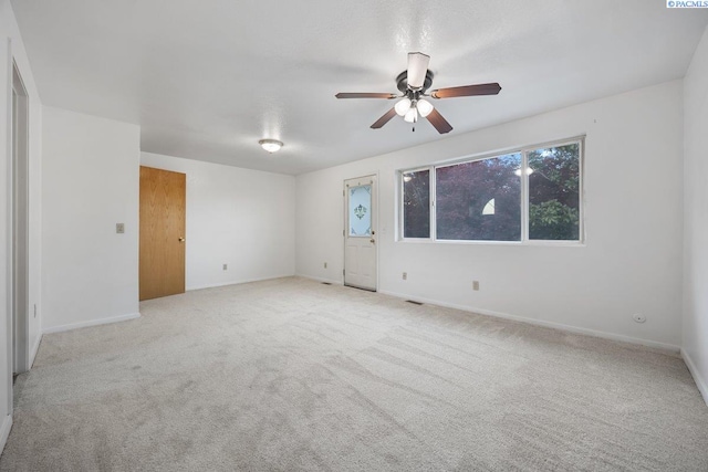 3715 Meadow Beauty Dr, Pasco, WA 99301 - carpeted empty room featuring visible vents, ceiling fan, and baseboards