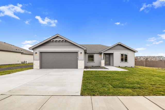 ranch-style home with a garage and a front yard