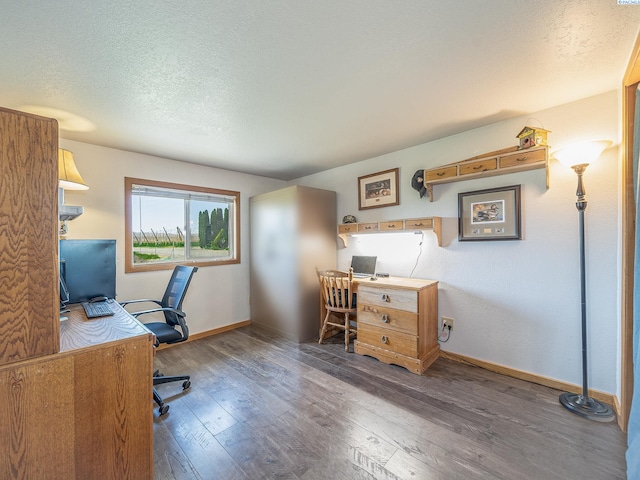 3680 E Euclid Rd, Mabton, WA 98935 - office featuring hardwood / wood-style flooring, baseboards, and a textured ceiling