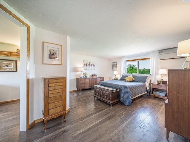 3680 E Euclid Rd, Mabton, WA 98935 - bedroom featuring dark wood-type flooring and baseboards