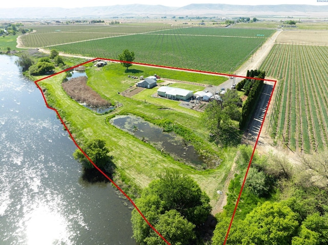 3680 E Euclid Rd, Mabton, WA 98935 - aerial view of sparsely populated area featuring abundant farmland, property boundaries highlighted, and a large body of water