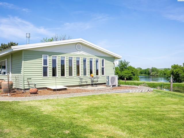 3680 E Euclid Rd, Mabton, WA 98935 - back of house with a yard, ac unit, and a water view