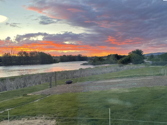 3680 E Euclid Rd, Mabton, WA 98935 - yard at dusk with a water view and a yard