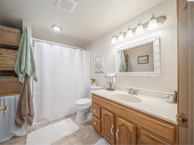 3680 E Euclid Rd, Mabton, WA 98935 - bathroom with toilet, vanity, and curtained shower