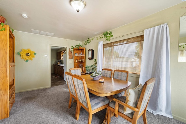 view of carpeted dining room