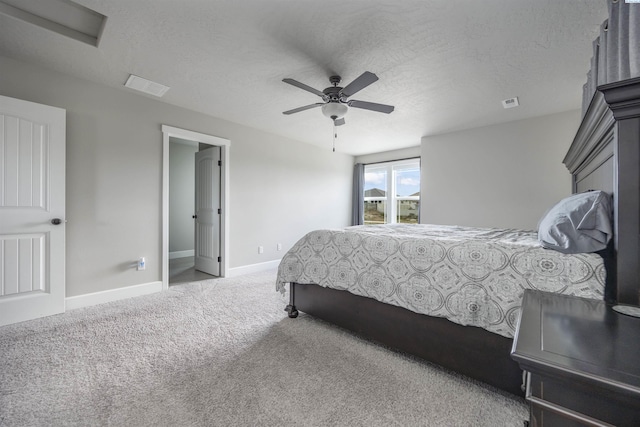 3303 S Taft St, Kennewick, WA 99338 - carpeted bedroom featuring baseboards, a textured ceiling, and a ceiling fan