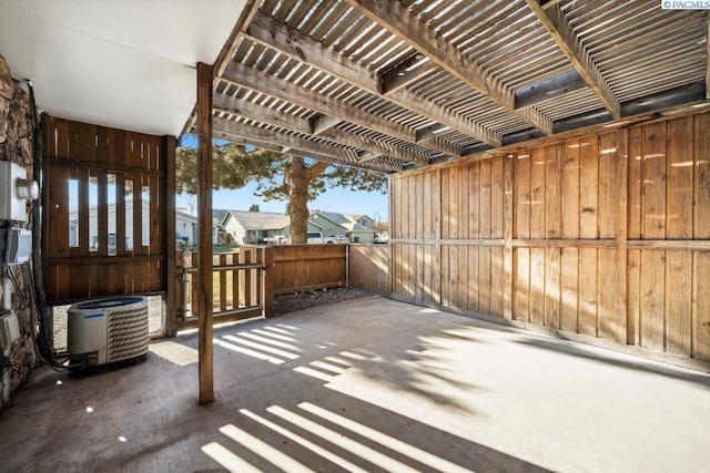 view of patio / terrace featuring a pergola and central AC