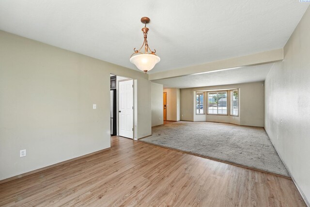 4505 S Dayton Ct, Kennewick, WA 99337 - empty room with light wood finished floors and baseboards