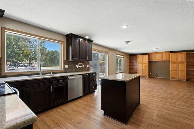 4505 S Dayton Ct, Kennewick, WA 99337 - kitchen featuring dishwasher, light wood-style floors, tasteful backsplash, light stone countertops, and recessed lighting