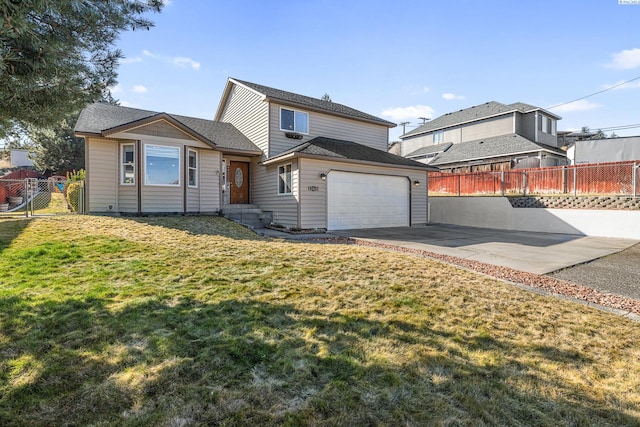 view of front of house featuring driveway, a front lawn, and fence