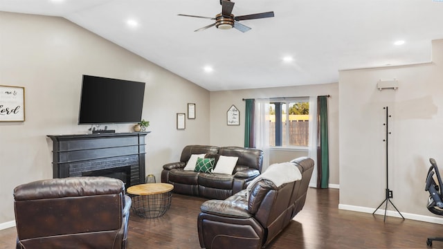 living room with ceiling fan, lofted ceiling, and dark hardwood / wood-style flooring