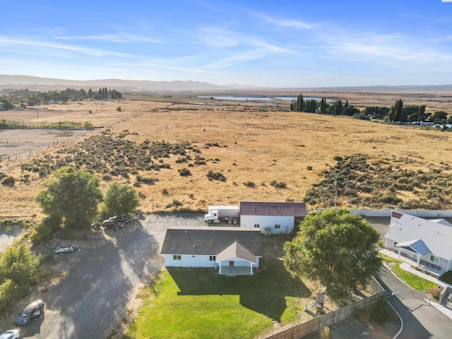 drone / aerial view with a rural view and a mountain view