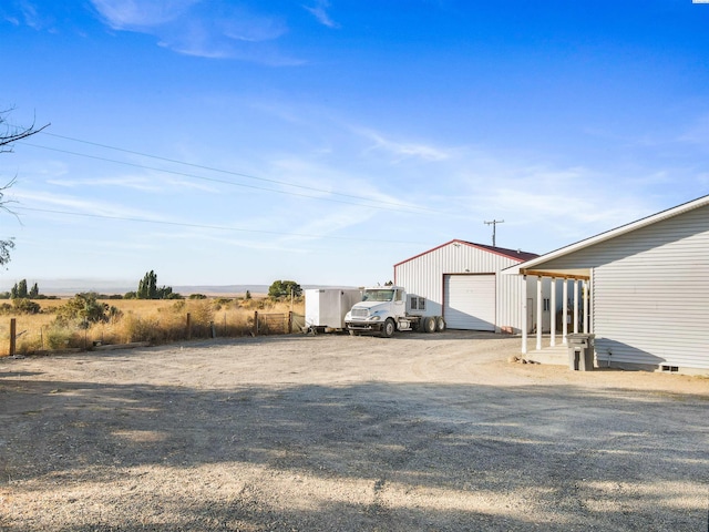 view of yard featuring a garage