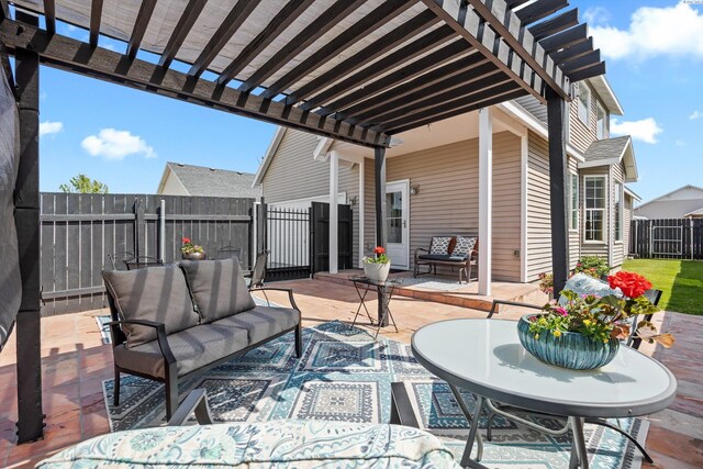 view of patio / terrace featuring an outdoor living space, a fenced backyard, and a pergola