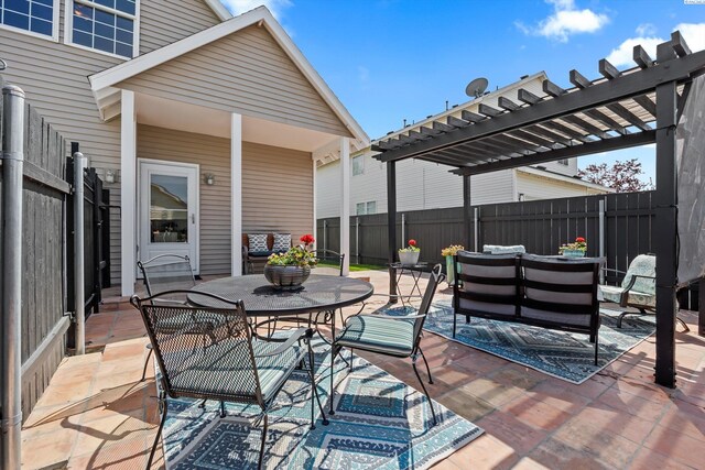 view of patio with an outdoor hangout area, a pergola, outdoor dining area, and a fenced backyard