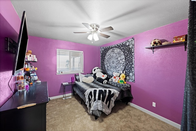bedroom with baseboards, carpet floors, and ceiling fan