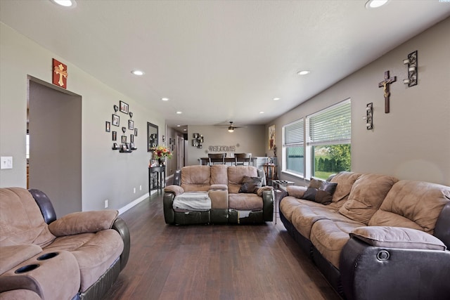 living room featuring recessed lighting, baseboards, dark wood-type flooring, and a ceiling fan