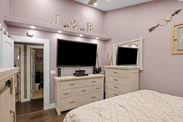 bedroom featuring recessed lighting and dark wood-style floors