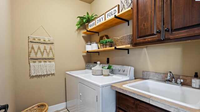 1905 S Harrison St, Kennewick, WA 99338 - clothes washing area with washing machine and clothes dryer and cabinet space