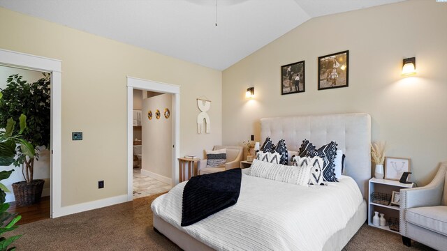 1905 S Harrison St, Kennewick, WA 99338 - carpeted bedroom featuring lofted ceiling, connected bathroom, and baseboards