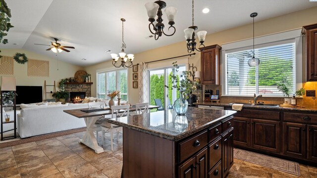 1905 S Harrison St, Kennewick, WA 99338 - kitchen with a sink, healthy amount of natural light, a chandelier, ceiling fan, and vaulted ceiling