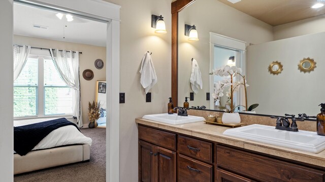 1905 S Harrison St, Kennewick, WA 99338 - ensuite bathroom featuring double vanity and a ceiling fan
