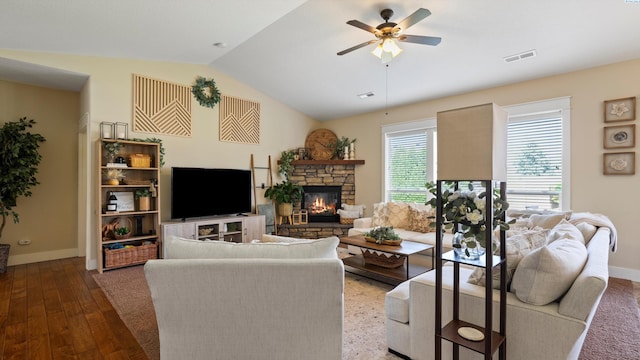 1905 S Harrison St, Kennewick, WA 99338 - living room with vaulted ceiling, a fireplace, ceiling fan, wood finished floors, and baseboards