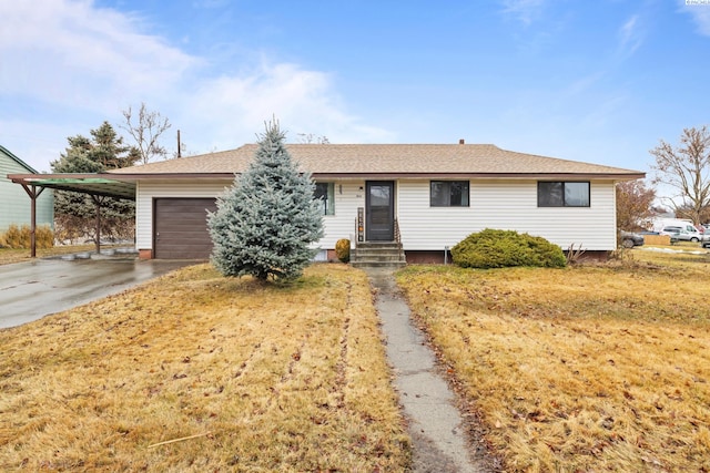 ranch-style home with roof with shingles, driveway, and an attached garage