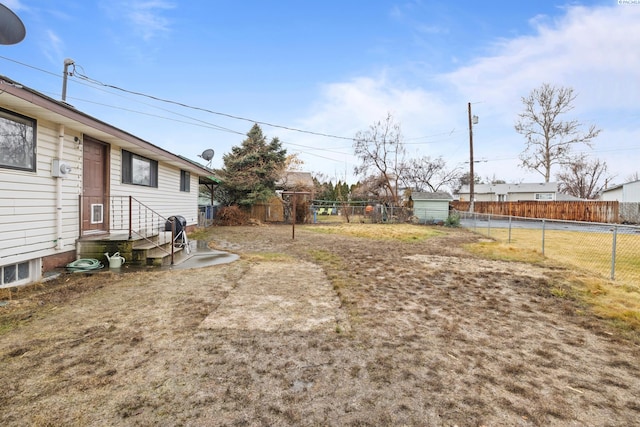 view of yard featuring fence