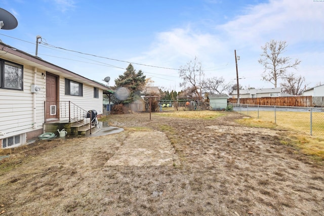 view of yard with fence