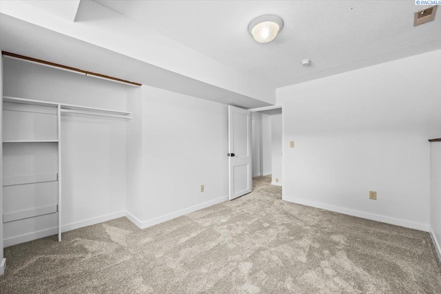 7009 W 8th Ave, Kennewick, WA 99336 - unfurnished bedroom with carpet, baseboards, and a closet