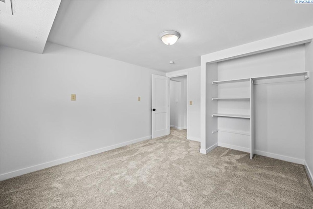 7009 W 8th Ave, Kennewick, WA 99336 - unfurnished bedroom with carpet flooring, baseboards, and a closet