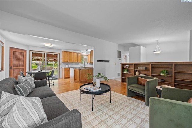 7009 W 8th Ave, Kennewick, WA 99336 - living area with light wood-style floors