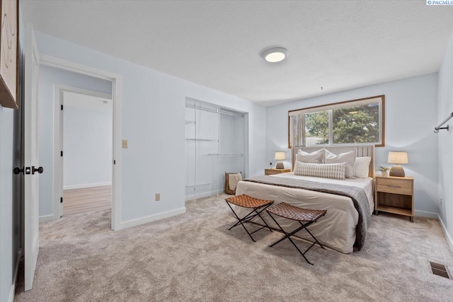 7009 W 8th Ave, Kennewick, WA 99336 - carpeted bedroom with baseboards and a closet