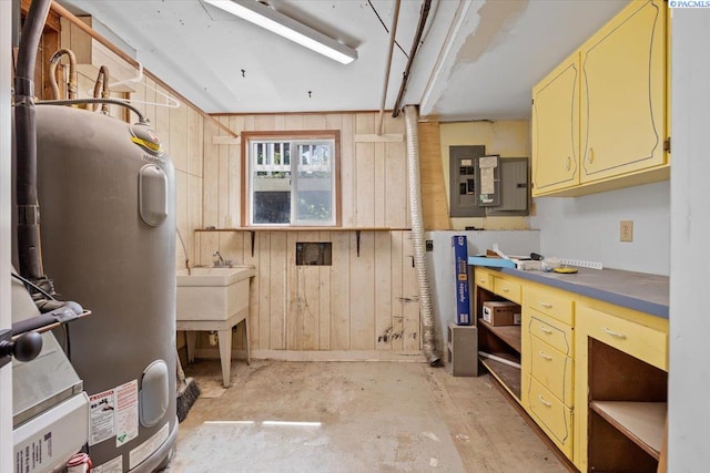 7009 W 8th Ave, Kennewick, WA 99336 - bathroom with water heater, wood walls, concrete flooring, and electric panel